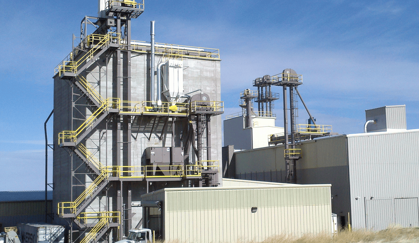 Industrial facility exterior with metal structures
