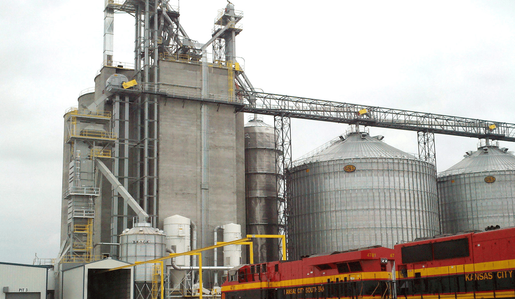 Large silos and train at grain facility