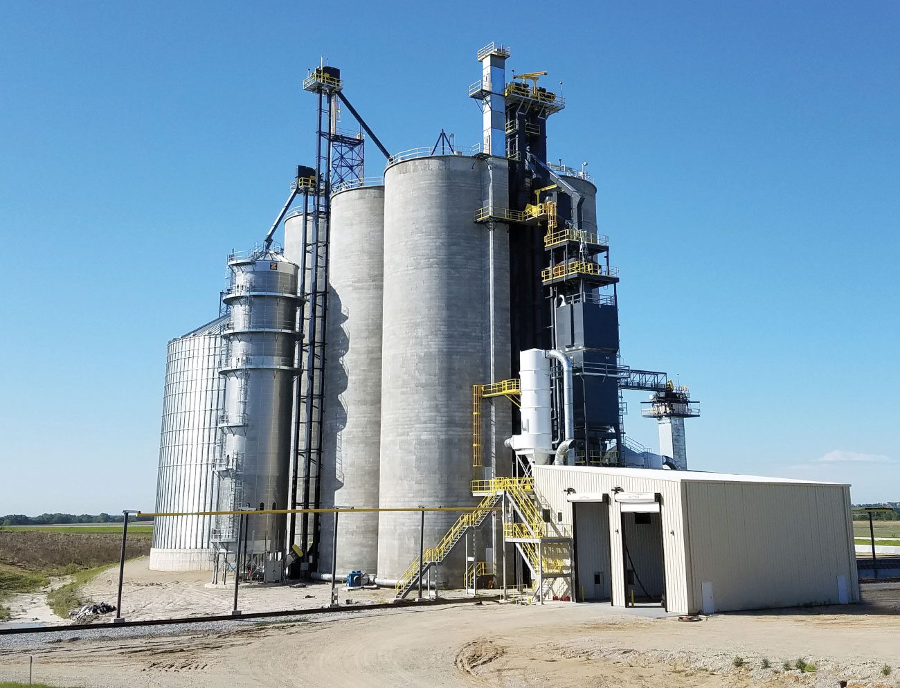 Large silos in rural landscape