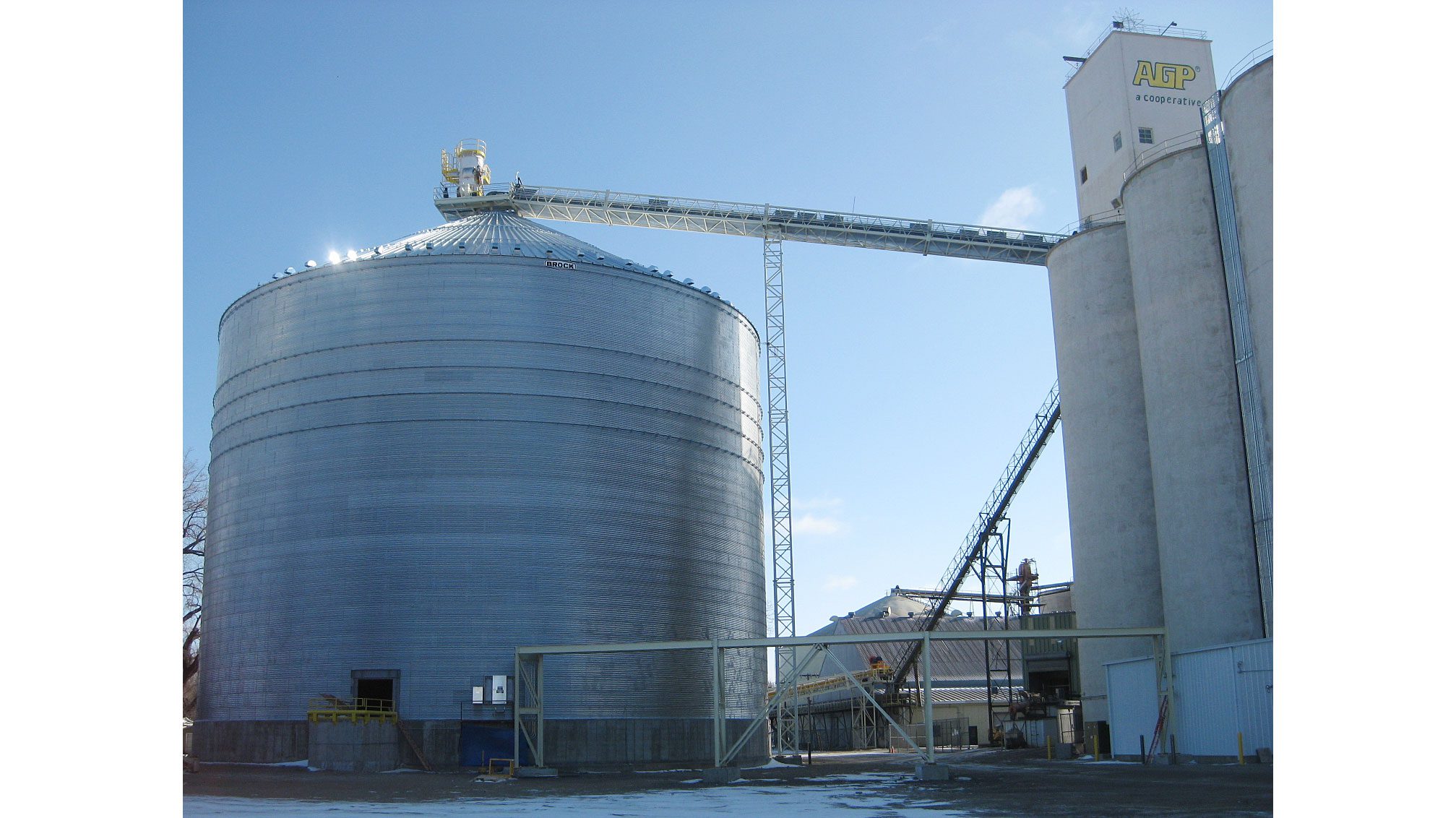 Grain storage silos under blue sky