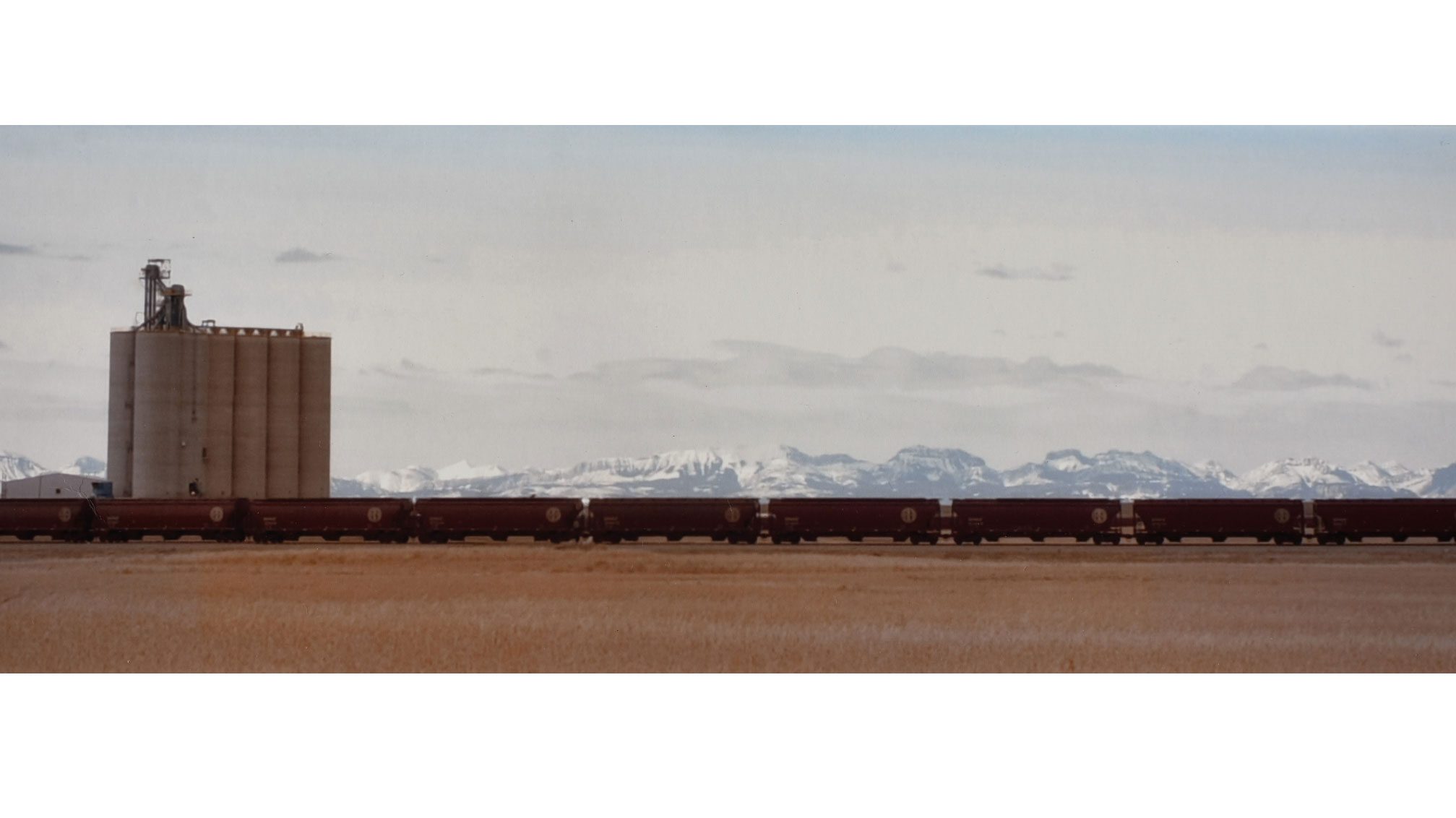 Freight train in rural landscape